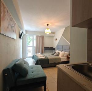 Postel nebo postele na pokoji v ubytování Nava Apartments