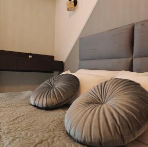 Postel nebo postele na pokoji v ubytování Nava Apartments
