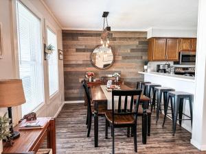 a dining room with a table and chairs at Beechview Condo in Beech Mountain