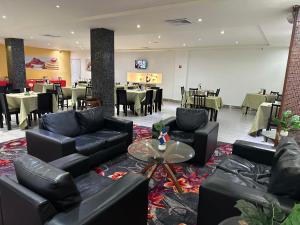 Posezení v ubytování Ramada by Wyndham Princess Santo Domingo