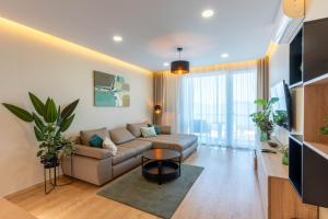 Posezení v ubytování Lakeside Panorama Apartment 115