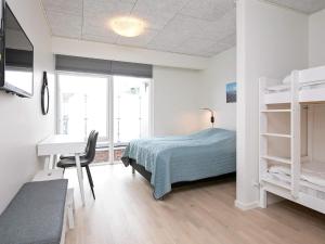 Postel nebo postele na pokoji v ubytování 8 person holiday home in Ringkøbing