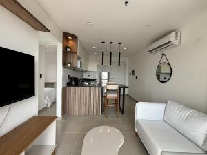 TV a/nebo společenská místnost v ubytování Molas tower 11E