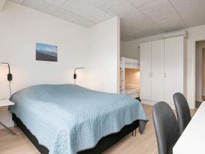 Postel nebo postele na pokoji v ubytování 8 person holiday home in Ringkøbing