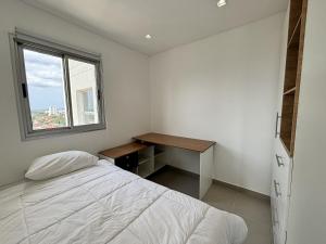 Postel nebo postele na pokoji v ubytování Molas tower 11E