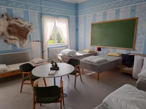 Letto o letti in una camera di Skolan