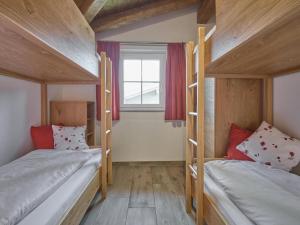 Posteľ alebo postele v izbe v ubytovaní BergbiberHAUS Top B