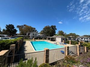 a swimming pool with a fence around it at Amazing house in La Jolla in San Diego