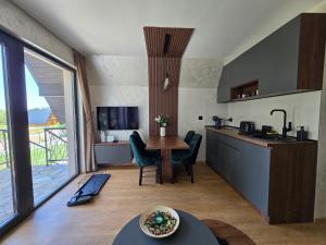 Kuchyň nebo kuchyňský kout v ubytování ZEN Luxury Houses & Spa