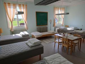 Letto o letti in una camera di Skolan