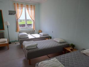 Letto o letti in una camera di Skolan