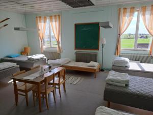Letto o letti in una camera di Skolan