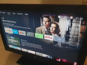 a television screen with a movie on it at Holiday Riverside Beach Camping in Gol