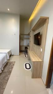 CASA TEMPORADA BARREIRINHAS Yellow 4客房内的一张或多张床位