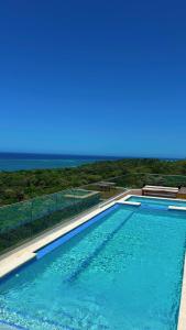 Bazén v ubytování The Mar Azul Studio Roatan nebo v jeho okolí