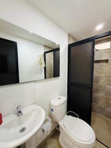Koupelna v ubytování Alojamiento en Doradal - Apartaestudio central