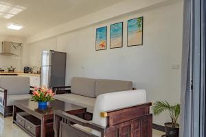 Kuchyň nebo kuchyňský kout v ubytování Ocean Breeze Apartment