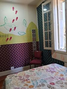 Hostel Trilhas e Rotas - a 150m da Avenida Paulista客房内的一张或多张床位