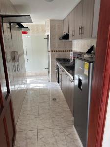 Η κουζίνα ή μικρή κουζίνα στο Apartamento 84 - 2 habitaciones +6 φωτογραφίες