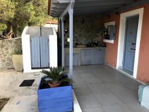 Kuchyň nebo kuchyňský kout v ubytování Agapi House Aegina Island