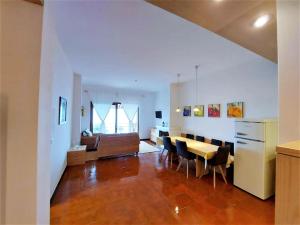 A seating area at Belvilla by OYO PAN03 3 - Residenza Panorama