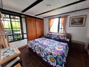 Postel nebo postele na pokoji v ubytování La casa de la montaña