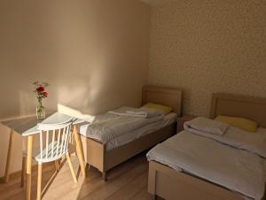 Voodi või voodid majutusasutuse Bee House toas