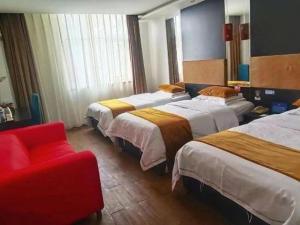 Postel nebo postele na pokoji v ubytování Super 8 Hotel Beijing New National Exhibition Yumin Street