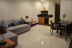Posezení v ubytování Mango Suites - Isabela