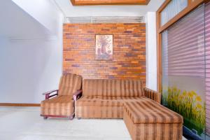 Posezení v ubytování Super Townhouse City Center Ernakulam