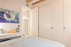 Rúm í herbergi á Penthouse with Rooftop apartment in the Barceloneta - Barcelona