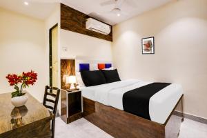 Postel nebo postele na pokoji v ubytování Hotel Orange Residency