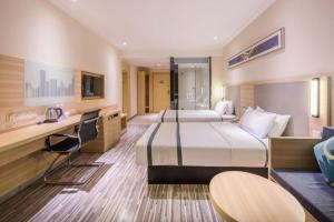 Postel nebo postele na pokoji v ubytování City Comfort Inn Nanning Railway East Station Langdong Bus Station + 188 fotografií