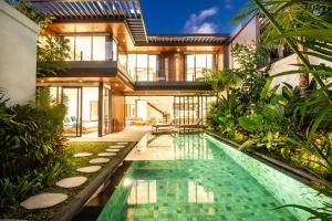 an image of a house with a swimming pool at New 4BR Villa 200m to the beach Canggu in Canggu