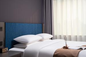 Fotografie z fotogalerie ubytování Xizi Libai Hotel v destinaci Chang-čou