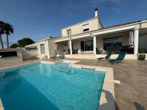 Πισίνα στο ή κοντά στο Villa élégance et sérénité