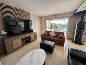 Μια τηλεόραση ή/και κέντρο ψυχαγωγίας στο Villa élégance et sérénité