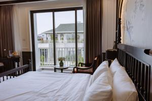 Postel nebo postele na pokoji v ubytování Maison Villa Hue 4PN + 32 fotografií