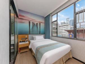 Katil atau katil-katil dalam bilik di Zhenxing Hotel +123 gambar