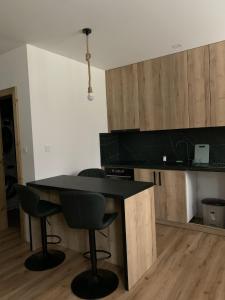 Kuchyň nebo kuchyňský kout v ubytování Apartmán Orchidea 3