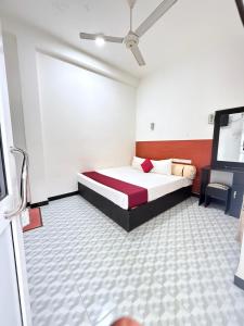 Postel nebo postele na pokoji v ubytování Cattleya Resorts Anuradhapura