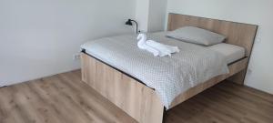 Postel nebo postele na pokoji v ubytování Apartmán Orchidea 3