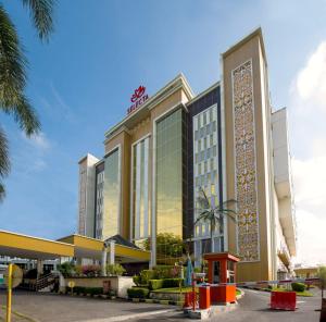 a rendering of the exterior of a hotel at SELECTA HOTEL Medan in Medan