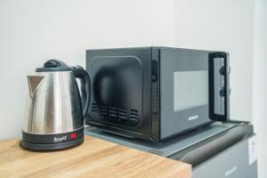 Παροχές για τσάι/καφέ στο Ava Guesthouse #2 - Cozy Room with Desk&Kitchenette