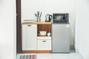 Η κουζίνα ή μικρή κουζίνα στο Ava Guesthouse #2 - Cozy Room with Desk&Kitchenette