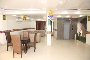 Posezení v ubytování Hotel Aman Inn