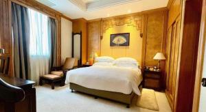 Postel nebo postele na pokoji v ubytování Xiamen Airlines Quanzhou Hotel