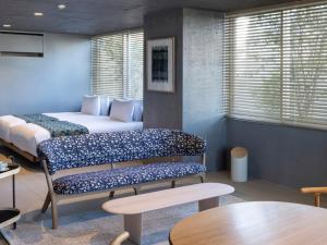 เตียงในห้องที่ SHIROIYA HOTEL +37 ภาพ