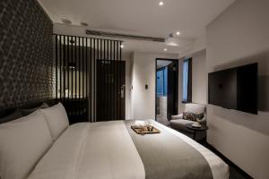 Postelja oz. postelje v sobi nastanitve Wonstar Hotel