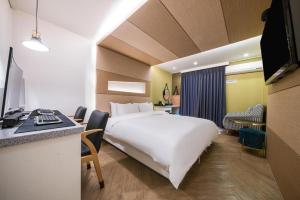 TV a/nebo společenská místnost v ubytování Haeundae Wow Motel